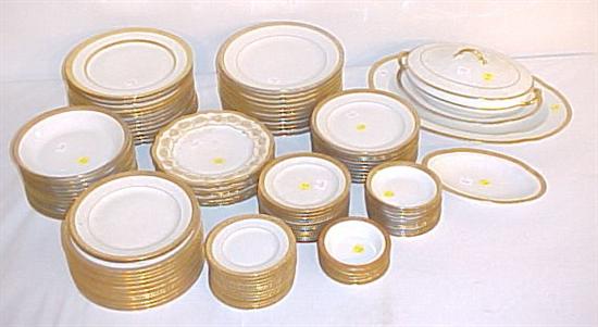 Appraisal: Etched gilt band china including several Limoges patterns dinner dessert