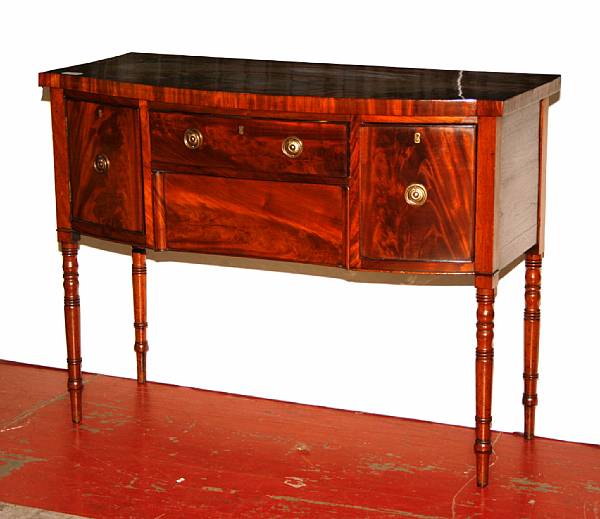 Appraisal: A George III mahogany bowfront sideboard last quarter th century