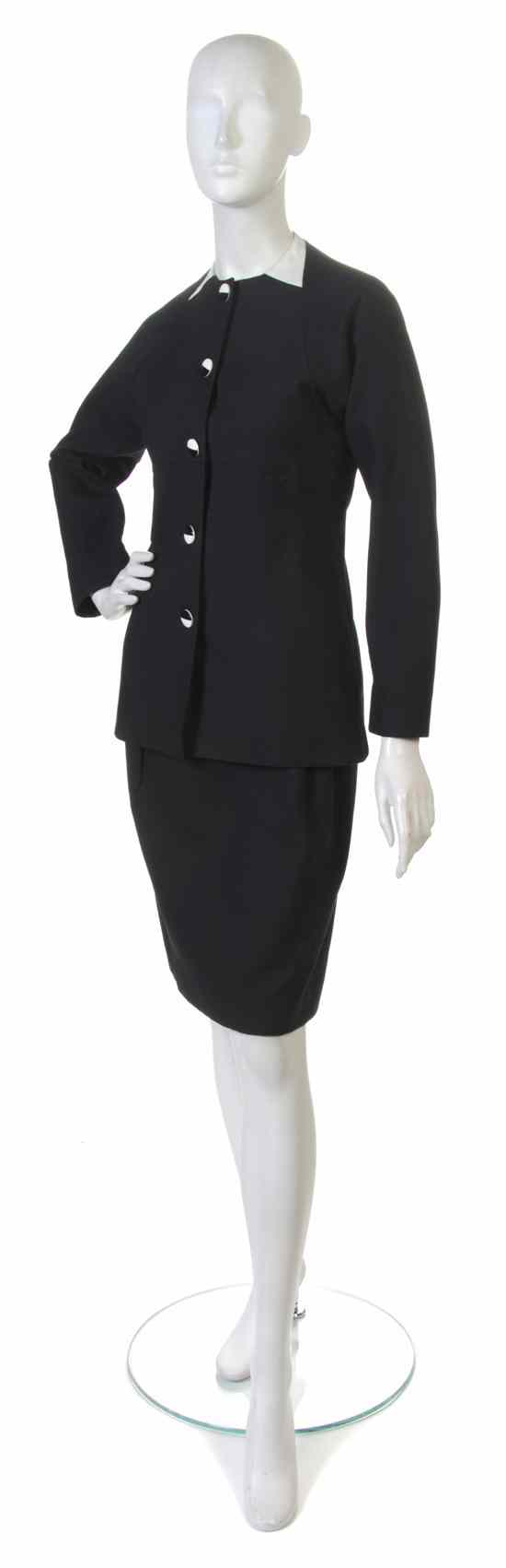 Appraisal: A Geoffrey Beene Black Cotton Skirt Suit Labeled Geoffrey Beene