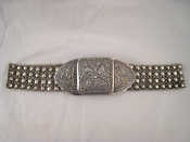 Appraisal: A white metal tests silver belt and buckle belt approx