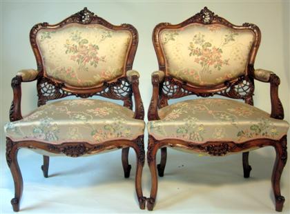 Appraisal: Louis XVI style three-piece carved walnut salon suiteComprising a settee