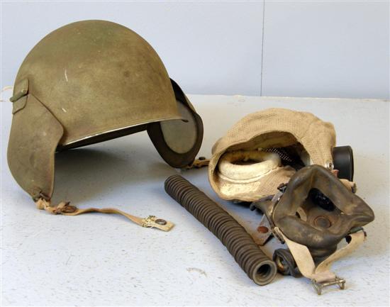 Appraisal: World War II tin helmet with cloth lining and breathing