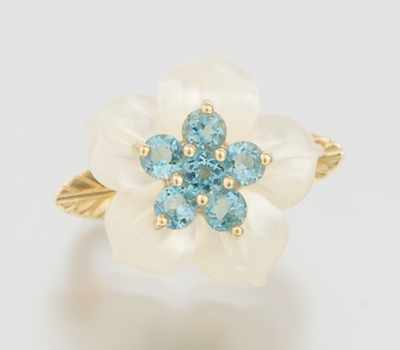 Appraisal: A Ladies' Carved Mother of Pearl and Blue Topaz Ring