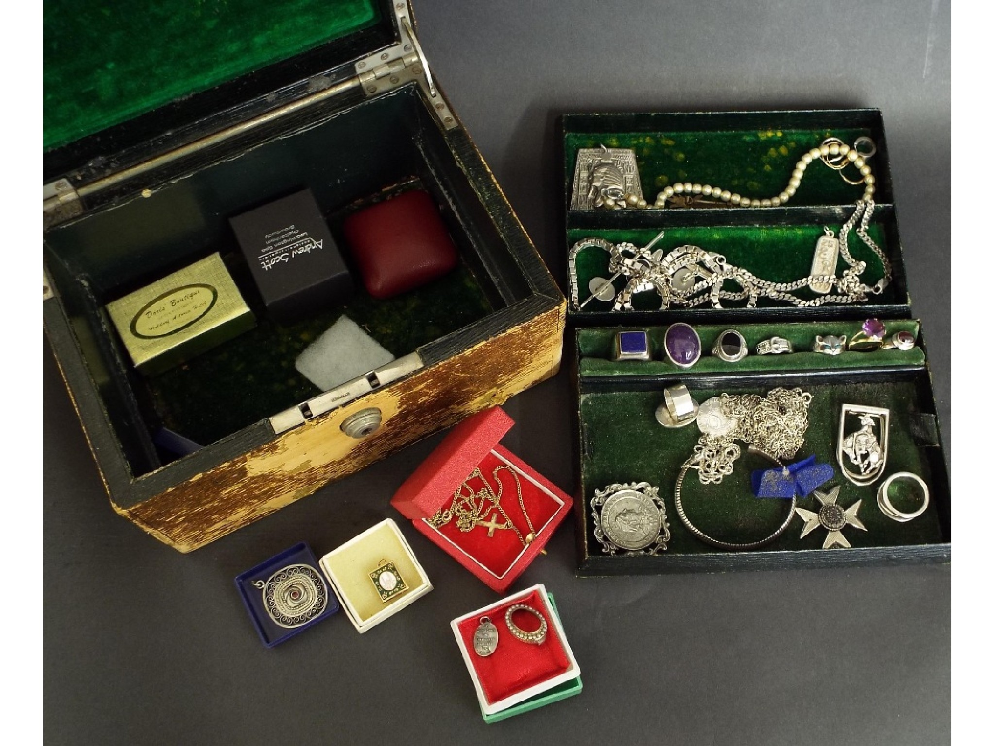 Appraisal: Leather bound jewellery box containing a mixed assortment of costume