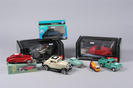 Appraisal: FOUR SCHUCO DIECAST MINIATURE TOY CARS Including Schuco sedan with