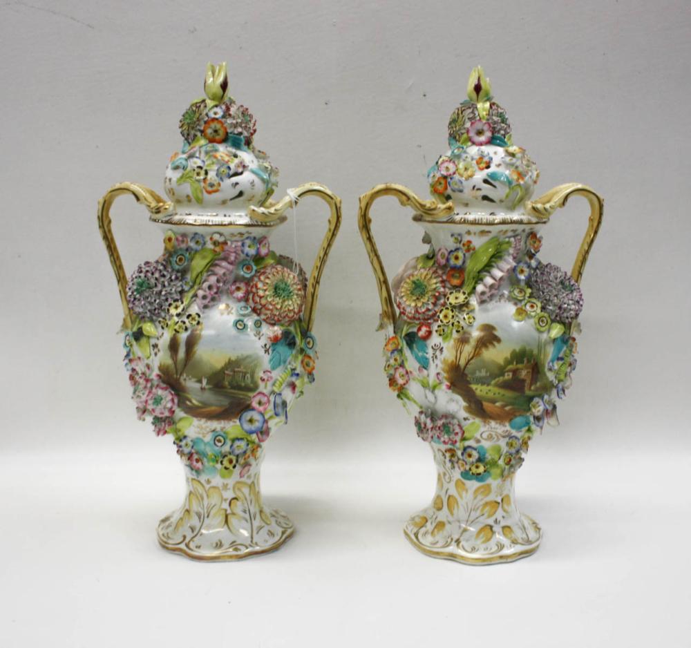 Appraisal: PAIR OF GERMAN PORCELAIN LIDDED URNS of baluster form with