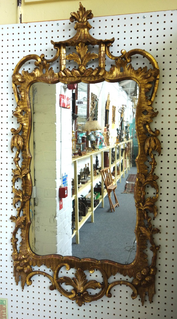 Appraisal: A th century gilt framed wall mirror of Chinese Chippendale