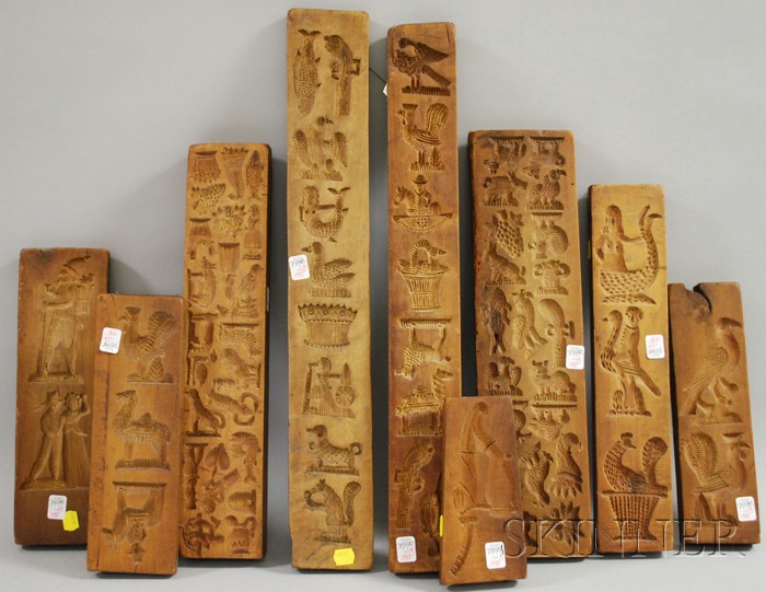 Appraisal: Nine Carved Wooden Figural Pastry Molds lg to in