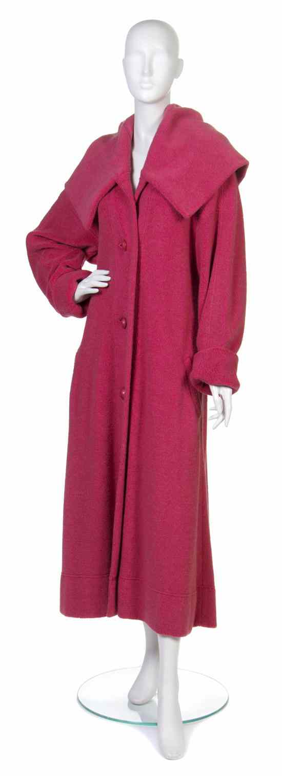 Appraisal: An Issey Miyake Red Coat oversized collar red buttons down