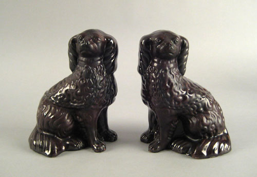 Appraisal: Pair of Pennsylvania or Virginia redware spaniels th c attributed