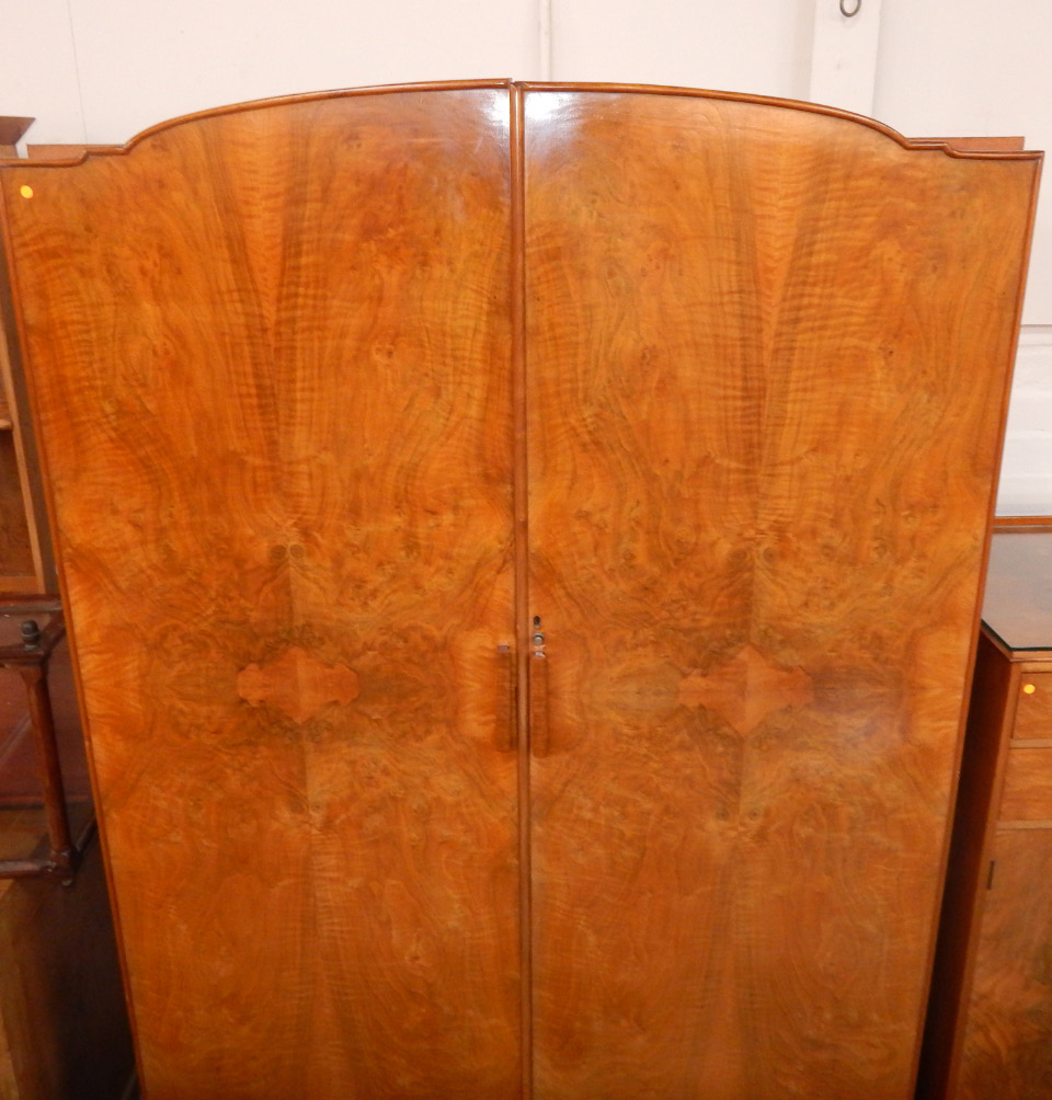 Appraisal: A 's figured walnut bedroom suite comprising fitted wardrobe compactum