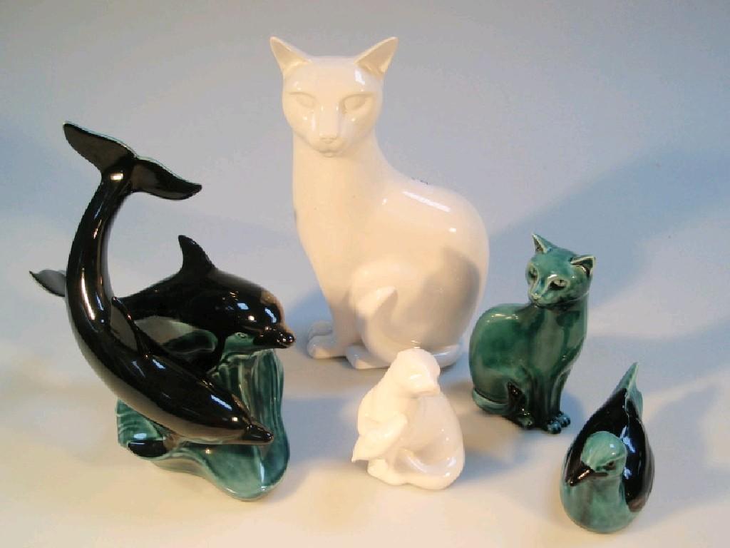 Appraisal: A Poole pottery white glaze figure of a seated cat