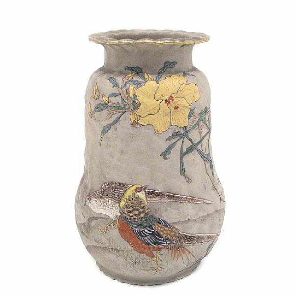 Appraisal: A Japanese molded and enameled biscuit porcelain vase depicting birds