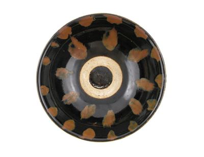 Appraisal: A Chinese black-glazed stoneware bowl decorated with rust brown splashes