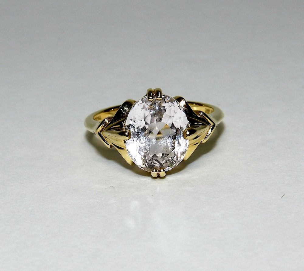 Appraisal: K Yellow Gold Oval Cut Quartz Ring Contemporary Central oval