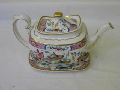 Appraisal: A SPODE PORCELAIN TEAPOT ON STAND of oblong form printed