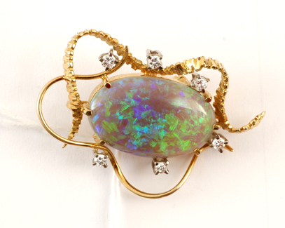 Appraisal: OPAL DOUBLET COCKTAIL BROOCH SET WITH DIAMOND IN CT GOLD