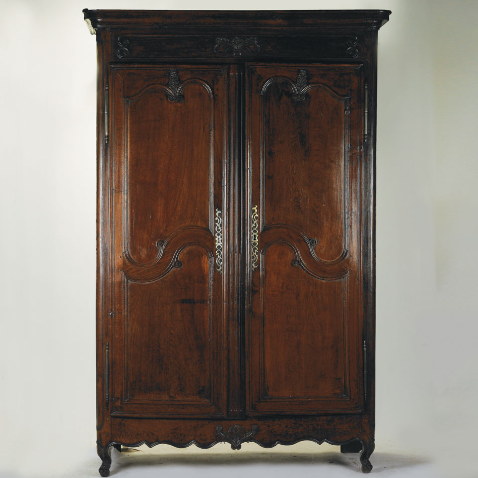 Appraisal: French Provincial Carved Walnut Armoire late th century x cm