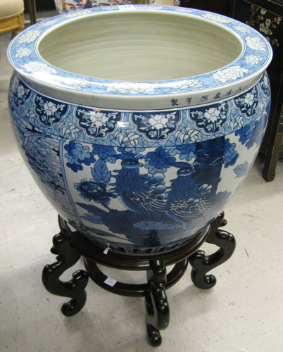 Appraisal: CHINESE PORCELAIN FISHBOWL ON STAND the bowl's exterior with blue