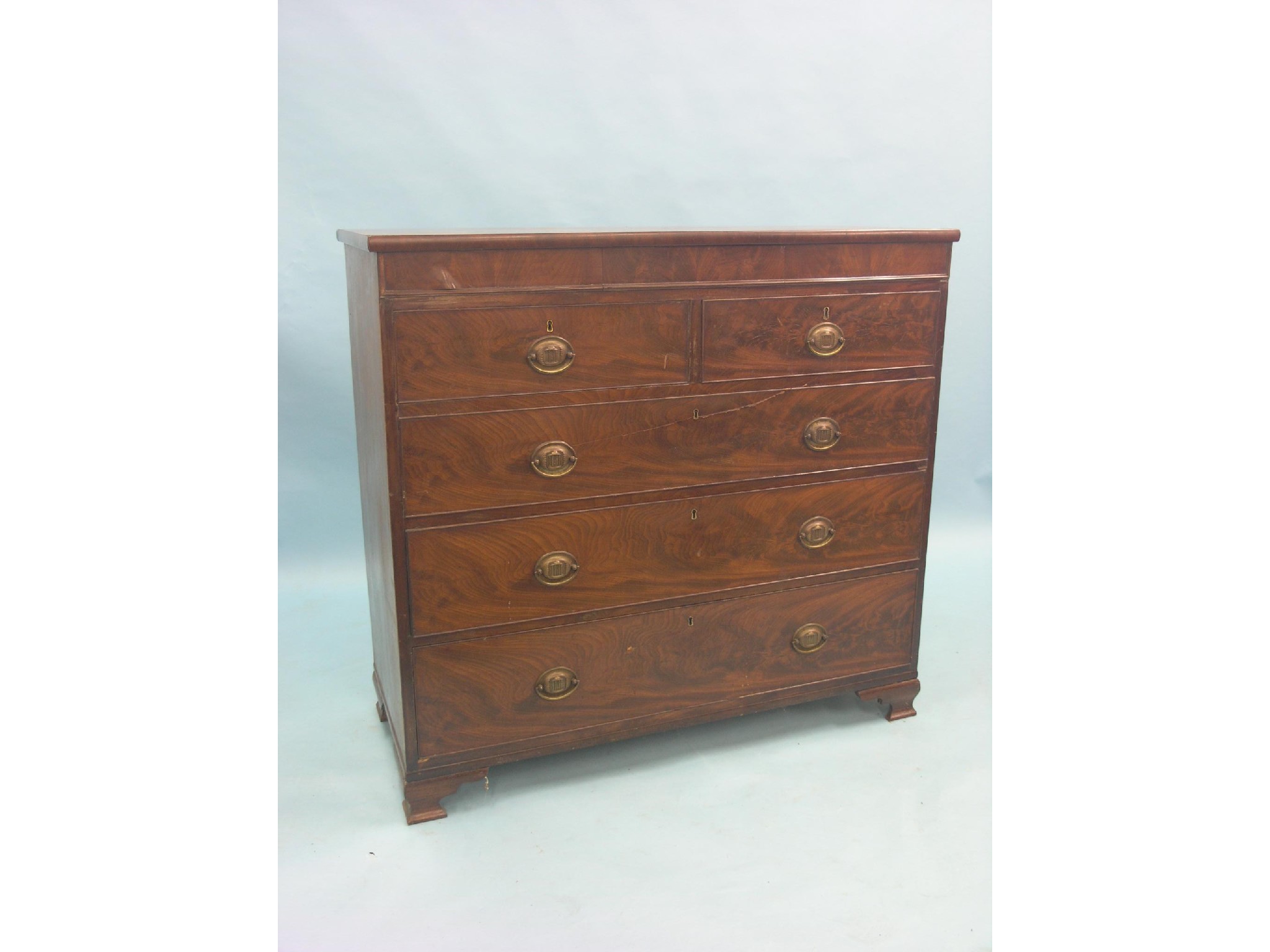 Appraisal: An early Victorian mahogany chest two short and three long