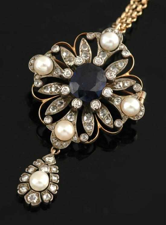 Appraisal: An Antique sapphire diamond and pearl pendant Of open floral