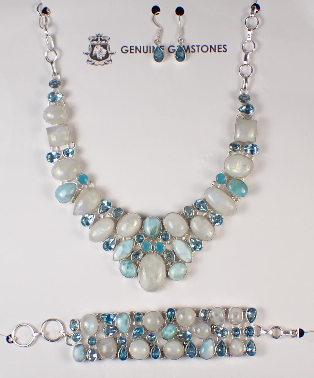 Appraisal: BLUE TOPAZ RAINBOW MOONSTONE AND LARIMAR JEWELRY SET including a