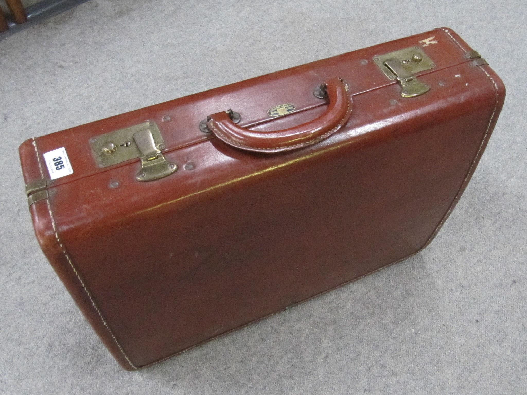 Appraisal: A leather suitcase