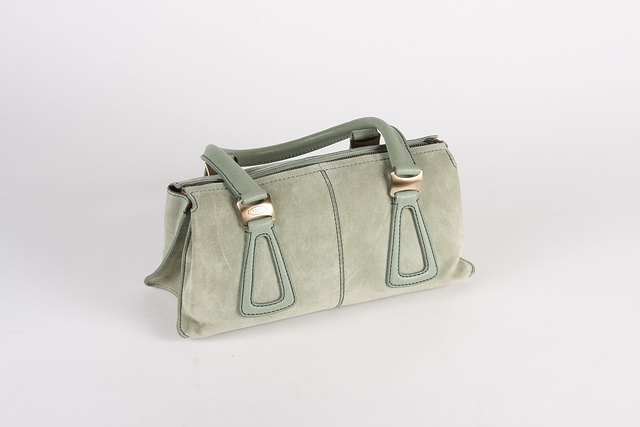 Appraisal: Tod's green suede leather handbag with gold brushed top zip