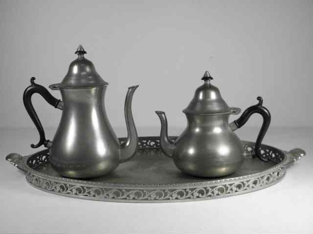 Appraisal: Royal Holland Pewter three-piece coffee tea set Includes a teapot