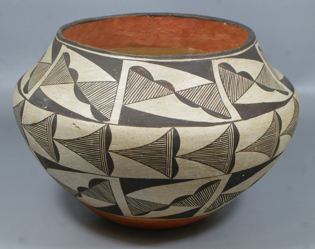 Appraisal: Acoma pottery olla with geometric decoration h dia bruise on