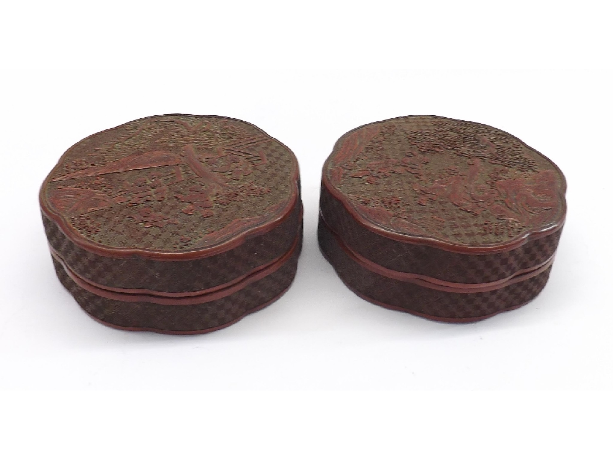 Appraisal: Pair of Chinese Cinnabar lacquer circular wavy shaped boxes and