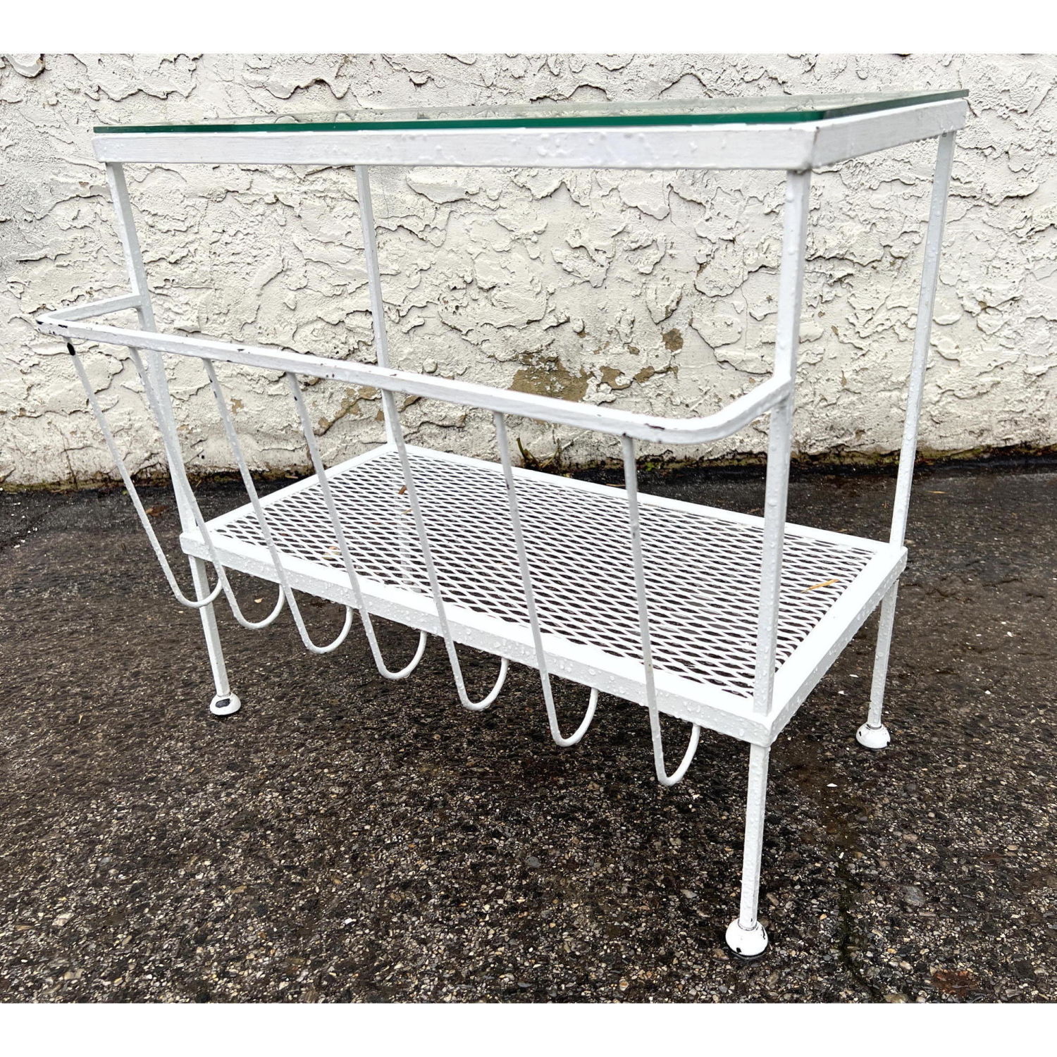 Appraisal: Salterini Style Glass Top Side Table with Newspaper Rack Dimensions