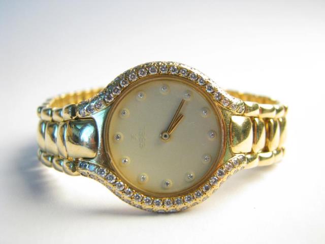 Appraisal: An K yellow gold lady's Ebel Beluga watch with diamond