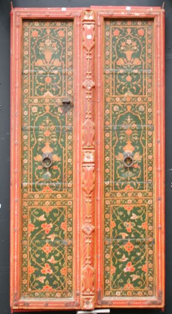 Appraisal: A carved wooden double door painted in traditional Bikaneri design