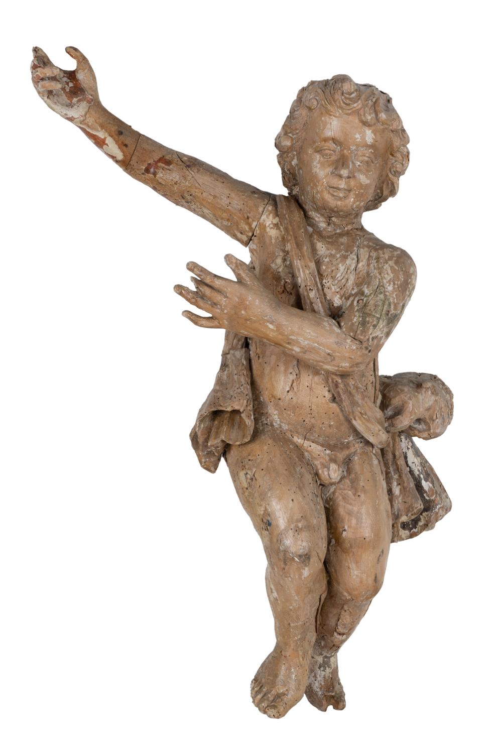 Appraisal: ITALIAN PAINTED CARVED WOOD CHERUBCondition loss to feet and areas