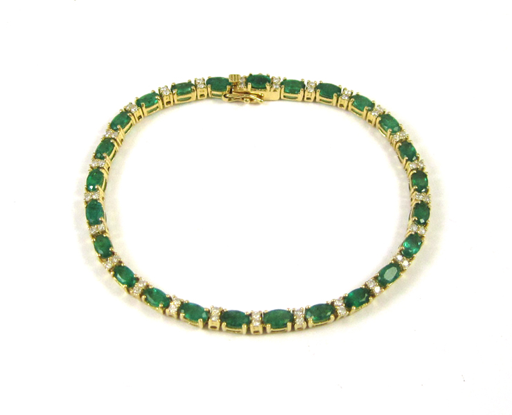 Appraisal: EMERALD AND EIGHTEEN KARAT GOLD BRACELET measuring - inches in