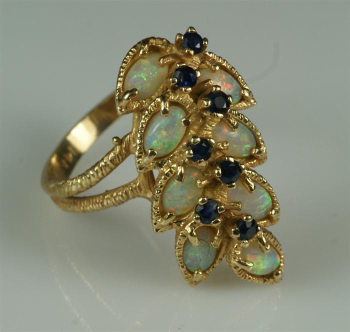 Appraisal: K YG opal with sapphire dinner ring size dwt total