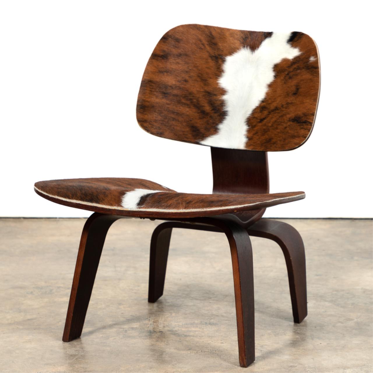 Appraisal: EAMES LCW STYLE PLYWOOD COWHIDE CHAIR LCW style plywood and