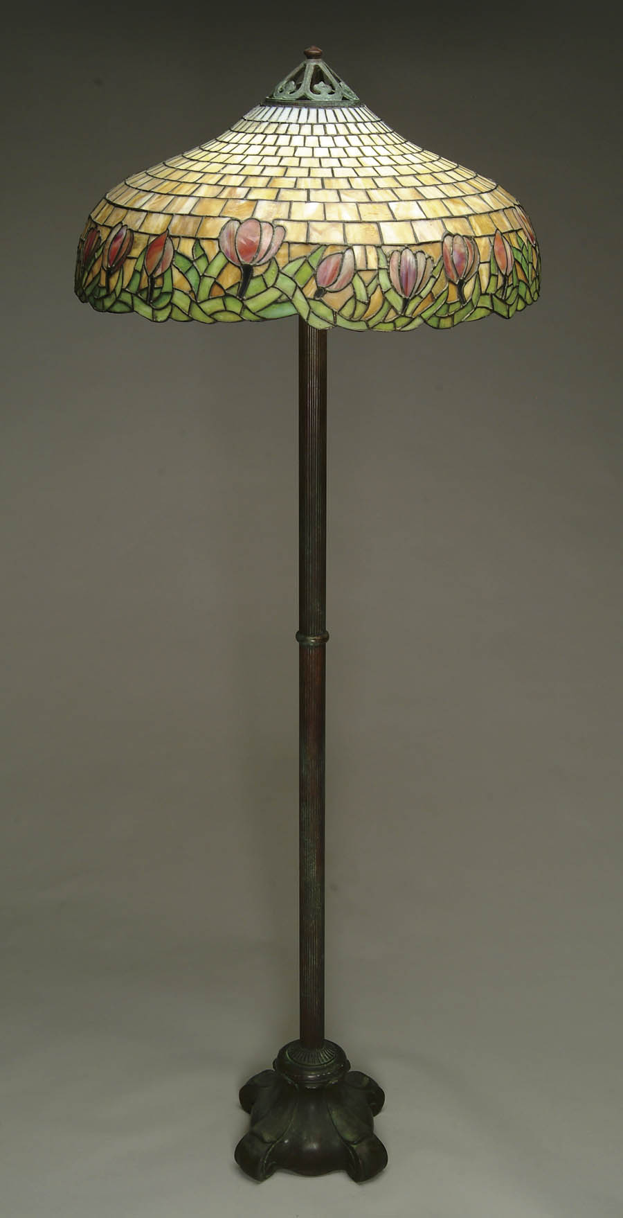 Appraisal: LEADED GLASS FLOOR LAMP Rose colored crocus floral border with