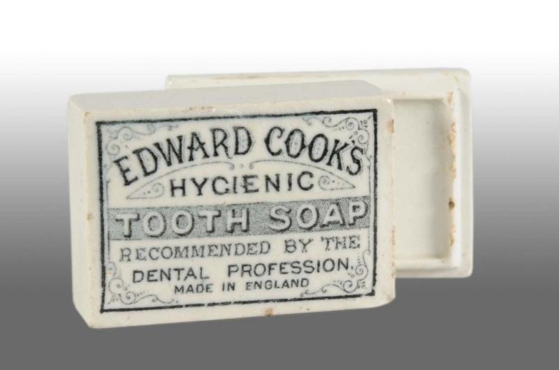 Appraisal: Rectangular Edward Cook's Tooth Soap Pot Lid Description Made in