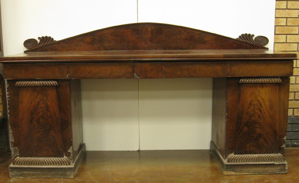 Appraisal: A th Century flamed mahogany pedestal Sideboard fluted design to