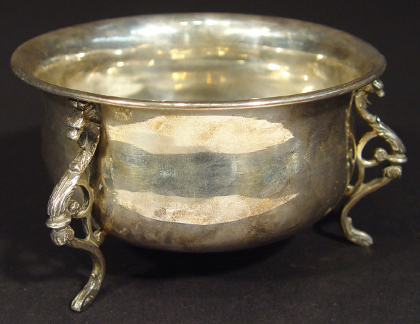 Appraisal: Edwardian silver sugar bowl the three feet modelled as griffins