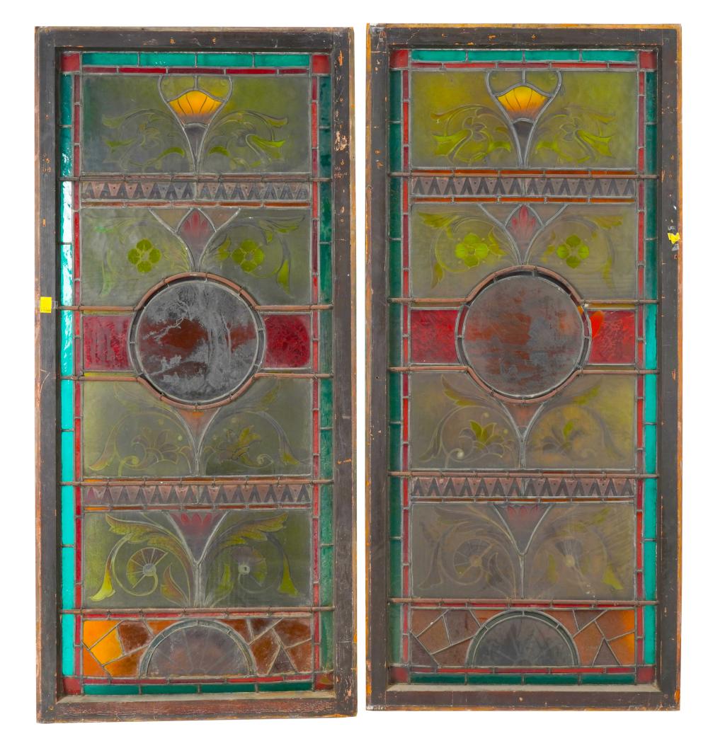 Appraisal: PAIR OF STAINED GLASS WINDOWSin wood frames x inches Condition