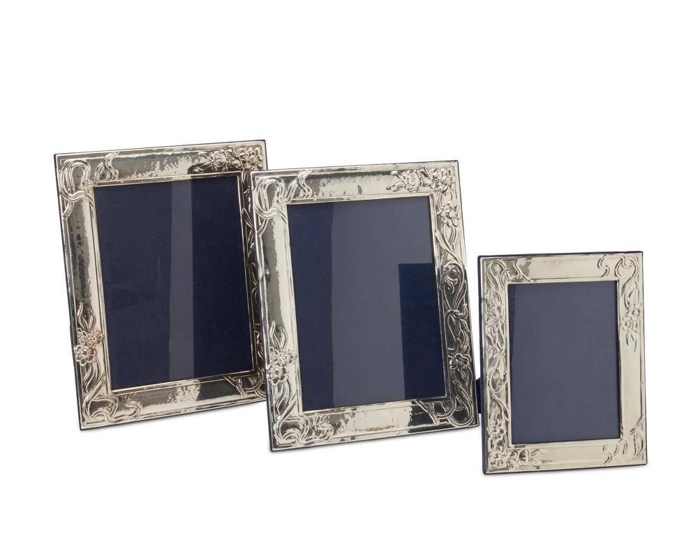 Appraisal: THREE CONTEMPORARY STERLING SILVER FRAMESThree contemporary sterling silver frames th