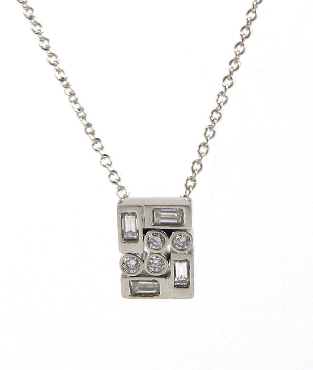 Appraisal: DIAMOND AND PLATINUM PENDANT NECKLACE with an platinum cable chain