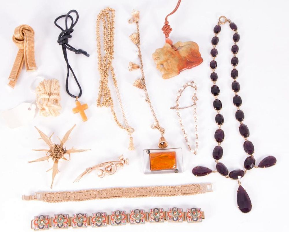 Appraisal: Collection of pieces of costume jewelry including amber bone jade