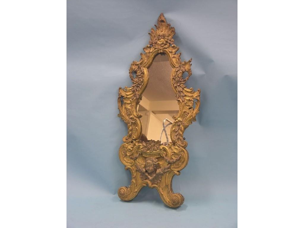 Appraisal: An th century South American giltwood mirror elaborately carved with