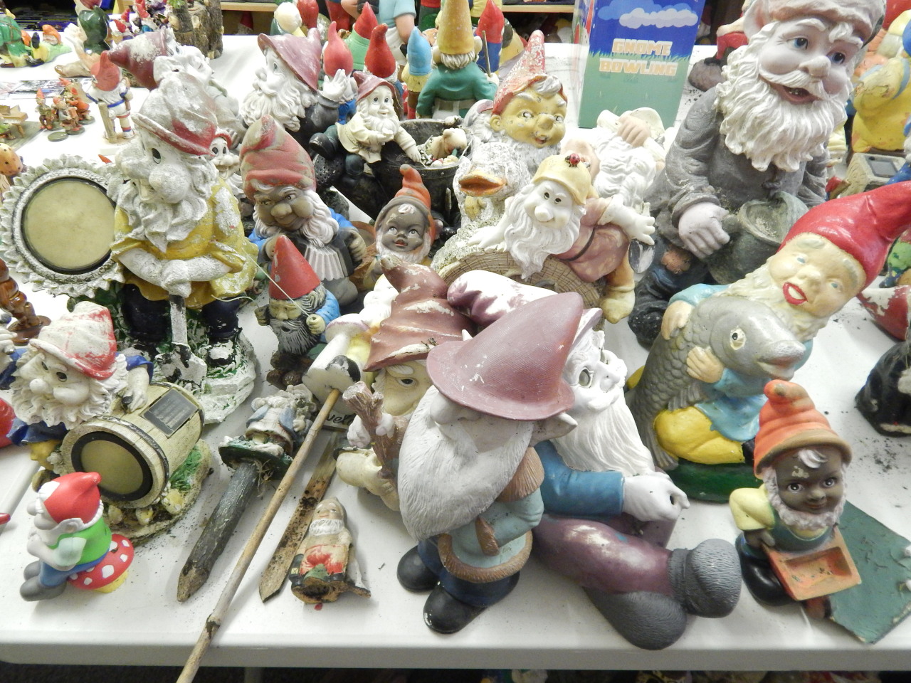 Appraisal: A large quantity of reconstituted plastic and other garden gnomes