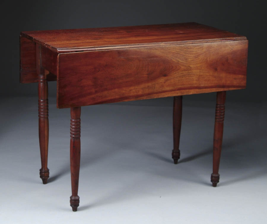 Appraisal: DROP LEAF ANTIQUE SHERATON TABLE Cherry wood having squared leaves