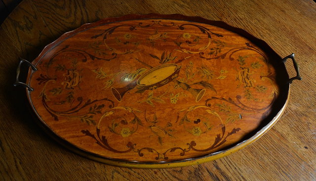 Appraisal: A th Century satinwood oval tea traywith inlaid musical instruments